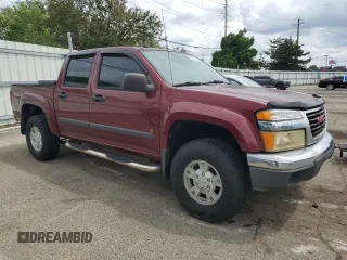 2008 GMC Canyon SLE2 z VIN 1GTDT13E088118164, wystawiony jako Copart lot #60001825 z przebiegiem 227 793 mil mil oraz Czysty tytuł • Clean title. Historia ofert i sprzedaży dostępna na DreamBid. Obrazek 4.