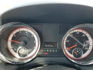 2014 Dodge Grand Caravan SE with VIN 2C4RDGBG2ER341797, listed as a Copart auction lot 49439405 with 102,633 mi miles and Salvage Title. Bid and sale history available at DreamBid. Image 9.