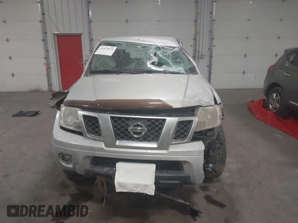 2015 Nissan Frontier SV with VIN 1N6AD0CW4FN751068, listed as a IAAI auction lot 41024078 with 900,000 mi miles and . Bid and sale history available at DreamBid. Image 12.