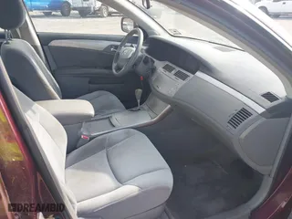 2005 Toyota Avalon XL with VIN 4T1BK36B25U057969, listed as a IAAI auction lot 41798579 with 241,831 mi miles. Bid and sale history available at carsss.com. Image 5.