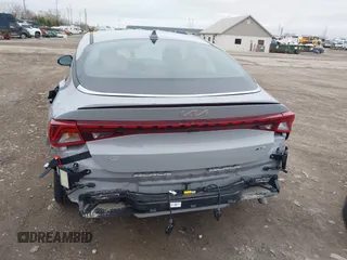 2024 Kia K5 GT-Line z VIN 5XXG64J23RG253362, wystawiony jako IAAI lot #41848600 z przebiegiem 17 481 mil mil oraz . Historia ofert i sprzedaży dostępna na DreamBid. Obrazek 17.