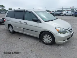 2006 Honda Odyssey LX with VIN 5FNRL38206B129663, listed as a IAAI auction lot 40978284 with 290,666 mi miles. Bid and sale history available at carsss.com. Image 1.