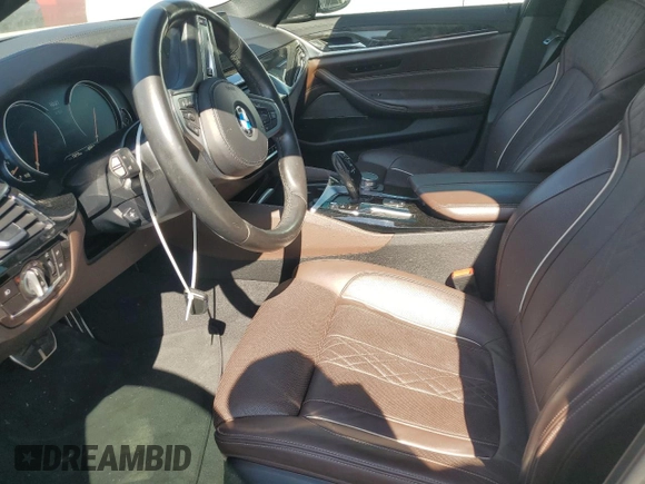 2018 BMW 5 Series 540i xDrive with VIN WBAJE7C52JG891212, listed as a Copart auction lot 58119195 with 73,770 mi miles and Salvage title. Bid and sale history available at DreamBid. Image 7.