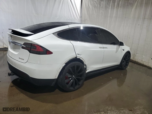2019 Tesla Model X P100D with VIN 5YJXCBE4XKF181738, listed as a Copart auction lot 70425394 with NaN miles and Salvage Title. Bid and sale history available at carsss.com. Image 3.