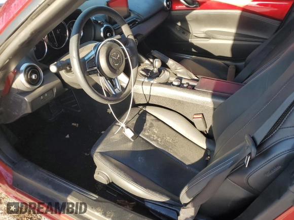 2023 Mazda MX-5 Miata Grand Touring with VIN JM1NDAM71P0559428, listed as a Copart auction lot 76596984 with 7,237 mi miles and Salvage title. Bid and sale history available at DreamBid. Image 7.
