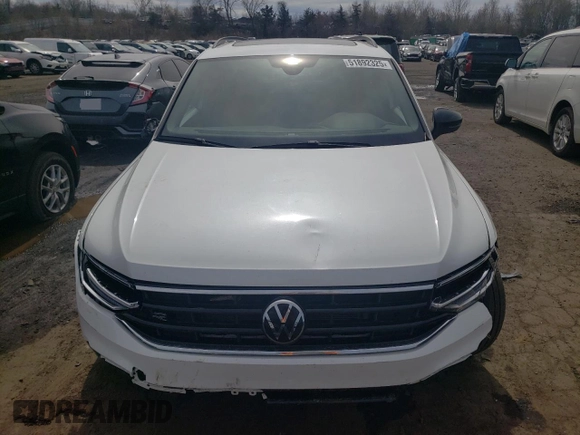 2023 Volkswagen Tiguan SE R-Line Black with VIN 3VV8B7AX9PM092316, listed as a Copart auction lot 51892325 with 24,058 mi miles and Salvage title. Bid and sale history available at DreamBid. Image 5.
