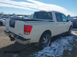 2009 Nissan Titan SE with VIN 1N6BA07D89N306682, listed as a IAAI auction lot 41348877 with 273,365 mi miles. Bid and sale history available at carsss.com. Image 4.