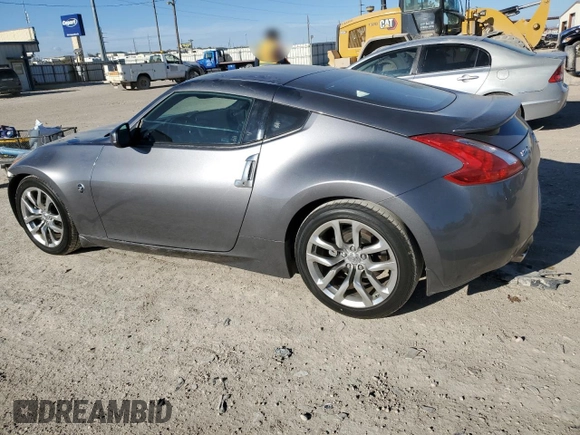 2014 Nissan 370Z Nismo with VIN JN1AZ4EH6EM633797, listed as a Copart auction lot 87879675 with 21,410 mi miles and Salvage Title. Bid and sale history available at DreamBid. Image 2.