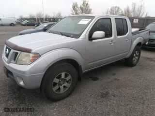 2011 Nissan Frontier PRO-4X with VIN 1N6AD0EV2BC438370, listed as a IAAI auction lot 41952484 with 217,529 mi miles. Bid and sale history available at carsss.com. Image 2.