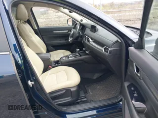 2019 Mazda CX-5 Touring with VIN JM3KFBCM5K0689948, listed as a IAAI auction lot 41976266 with 74,812 mi miles. Bid and sale history available at carsss.com. Image 5.