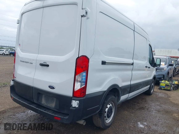 2023 Ford Transit Cargo with VIN 1FTBR1C8XPKC07063, listed as a IAAI auction lot 42103484 with 12,946 mi miles. Bid and sale history available at carsss.com. Image 4.