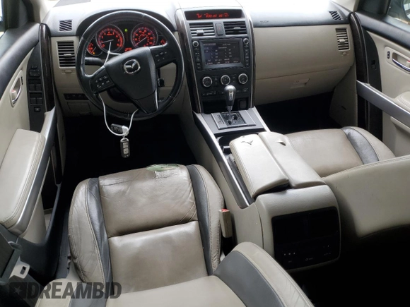 2012 Mazda CX-9 Grand Touring with VIN JM3TB3DV2C0336355, listed as a Copart auction lot 61687975 with 150,580 mi miles and Salvage title. Bid and sale history available at DreamBid. Image 8.