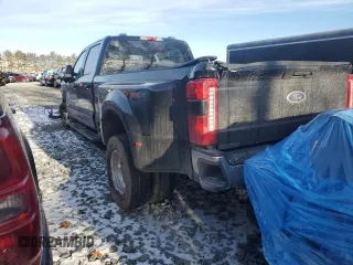 2023 Ford F-350 XL with VIN 1FT8W3DM2PED14021, listed as a Copart auction lot 87533355 with 86,991 mi miles and Salvage Title. Bid and sale history available at DreamBid. Image 2.