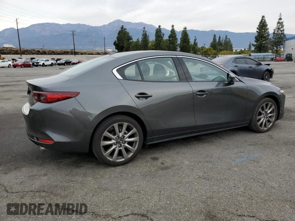 2022 Mazda 3 Premium with VIN 3MZBPADL9NM311250, listed as a Copart auction lot 86020464 with 10,237 mi miles and Salvage Title. Bid and sale history available at DreamBid. Image 3.