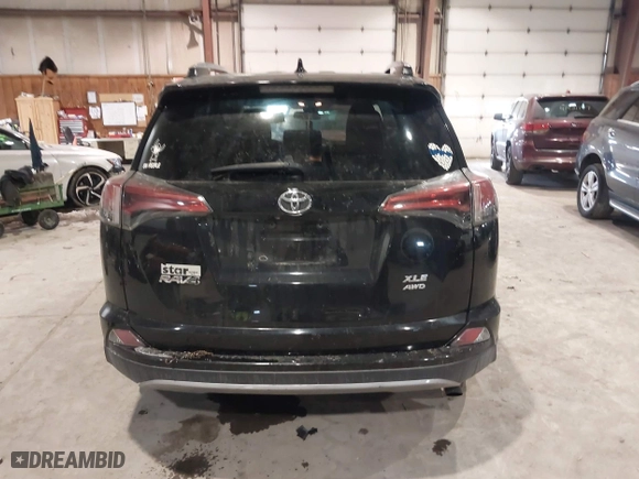 2017 Toyota RAV4 XLE with VIN 2T3RFREV0HW669312, listed as a IAAI auction lot 41410721 with 99,404 mi miles. Bid and sale history available at carsss.com. Image 16.