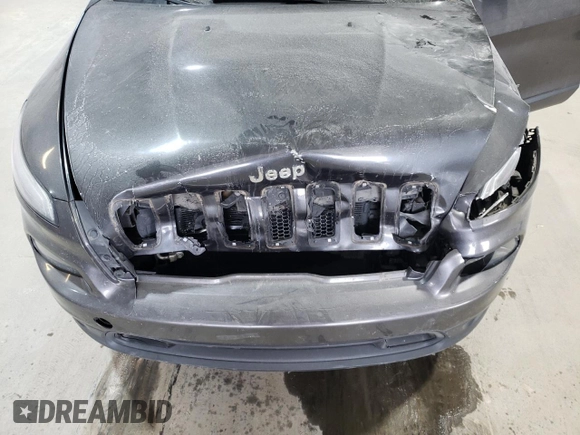 2015 Jeep Cherokee Latitude with VIN 1C4PJMCS7FW504728, listed as a Copart auction lot 81674984 with 144,342 mi miles and Salvage Title. Bid and sale history available at carsss.com. Image 12.