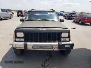 1995 Jeep Cherokee Country with VIN 1J4FJ78S4SL631318, listed as a Copart auction lot 63087634 with 295,577 mi miles and Salvage Title. Bid and sale history available at carsss.com. Image 5.