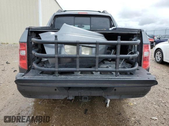 2011 Honda Ridgeline RTL with VIN 5FPYK1F52BB009042, listed as a Copart auction lot 69439004 with 119,889 mi miles and Salvage Title. Bid and sale history available at carsss.com. Image 6.