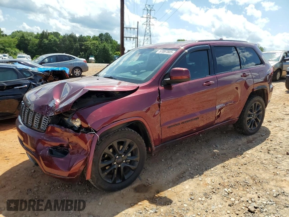 2017 Jeep Grand Cherokee Altitude with VIN 1C4RJEAG9HC702924, listed as a Copart auction lot 57897805 with 133,796 mi miles and Salvage title. Bid and sale history available at DreamBid. Image 1.