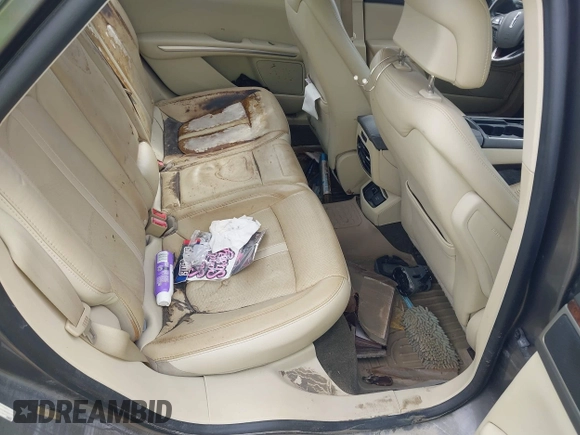 2014 Lincoln MKZ Hybrid with VIN 3LN6L2LU1ER814964, listed as a IAAI auction lot 40712613 with Not provided miles and . Bid and sale history available at DreamBid. Image 8.