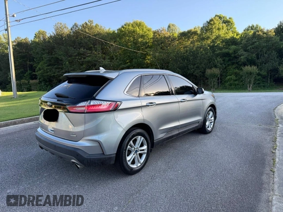 2020 Ford Edge SEL with VIN 2FMPK3J96LBA29136, listed as a Copart auction lot 66417635 with 97,151 mi miles and Clean title. Bid and sale history available at DreamBid. Image 4.