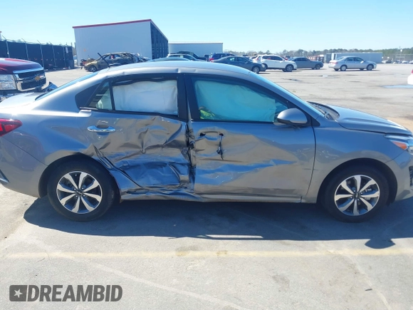 2022 Kia Rio S with VIN 3KPA24AD5NE481448, listed as a IAAI auction lot 41748379 with 65,123 mi miles. Bid and sale history available at carsss.com. Image 13.