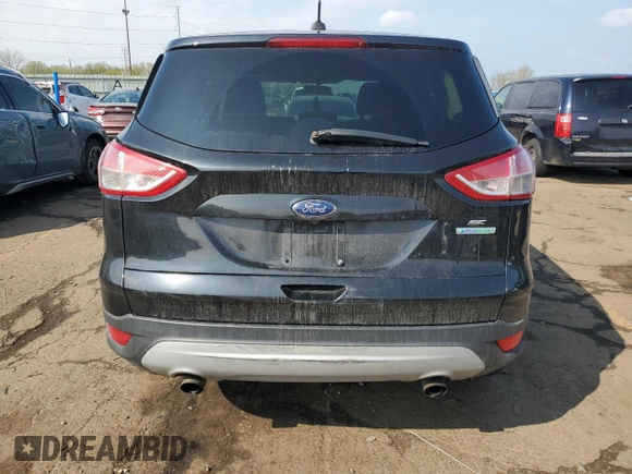 2014 Ford Escape SE with VIN 1FMCU0GX6EUA37327, listed as a Copart auction lot 55298925 with 129,497 mi miles and Clean Title. Bid and sale history available at carsss.com. Image 6.