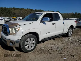 2012 Toyota Tundra z VIN 5TFRM5F15CX036352, wystawiony jako Copart lot #49799285 z przebiegiem 123 812 mil mil oraz Czysty tytuł • Clean title. Historia ofert i sprzedaży dostępna na DreamBid. Obrazek 1.