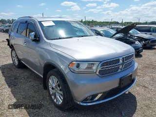 2014 Dodge Durango Citadel with VIN 1C4RDJEG2EC331045, listed as a IAAI auction lot 39913905 with 163,248 mi miles and . Bid and sale history available at DreamBid. Image 1.