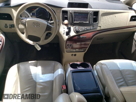 2011 Toyota Sienna XLE AAS with VIN 5TDYK3DC4BS095486, listed as a Copart auction lot 60629475 with 232,462 mi miles and Salvage title. Bid and sale history available at DreamBid. Image 8.