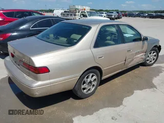 1997 Toyota Camry LE z VIN JT2BF22K6V0081619, wystawiony jako IAAI lot #42344289 z przebiegiem Nie podano mil oraz . Historia ofert i sprzedaży dostępna na DreamBid. Obrazek 4.