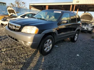 2001 Mazda Tribute LX with VIN 4F2YU08121KM39887, listed as a Copart auction lot 86369324 with 194,581 mi miles and Salvage Title. Bid and sale history available at DreamBid. Image 1.