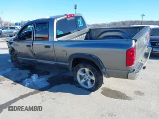 2007 Dodge 1500 SLT with VIN 1D7HU18207J523662, listed as a IAAI auction lot 41215939 with 250,725 mi miles. Bid and sale history available at carsss.com. Image 3.