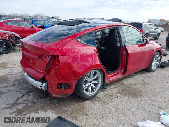 2023 Tesla Model Y Long Range with VIN 7SAYGDEE5PA198483, listed as a IAAI auction lot 41433952 with 24,753 mi miles and . Bid and sale history available at DreamBid. Image 4.