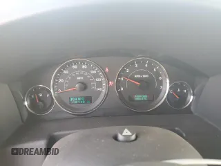 2007 Jeep Commander Limited with VIN 1J8HG58P87C595890, listed as a Copart auction lot 71123654 with 148,438 mi miles and Salvage Title. Bid and sale history available at carsss.com. Image 9.