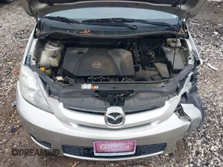 2007 Mazda 5 Touring with VIN JM1CR29L570139627, listed as a IAAI auction lot 41153270 with 90,228 mi miles and . Bid and sale history available at carsss.com. Image 10.