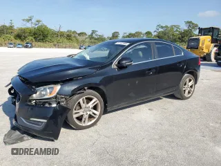 2015 Volvo S60 T5 Drive-E Premier z VIN YV140MFB1F1306249, wystawiony jako Copart lot #57187495 z przebiegiem 119 978 mil mil oraz Szkoda całkowita • Salvage title. Historia ofert i sprzedaży dostępna na DreamBid. Obrazek 1.