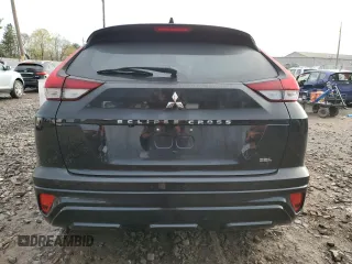 2022 Mitsubishi Eclipse Cross SE z VIN JA4ATWAA0NZ068298, wystawiony jako Copart lot #53016485 z przebiegiem 35 641 mil mil oraz Szkoda całkowita • Salvage title. Historia ofert i sprzedaży dostępna na DreamBid. Obrazek 6.