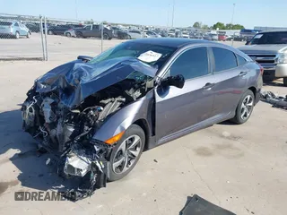 2020 Honda Civic LX z VIN 19XFC2F68LE023059, wystawiony jako IAAI lot #41856327 z przebiegiem 84 499 mil mil oraz . Historia ofert i sprzedaży dostępna na DreamBid. Obrazek 2.