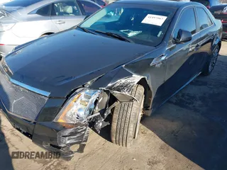 2012 Cadillac CTS Performance with VIN 1G6DJ5E37C0108606, listed as a IAAI auction lot 41497567 with 138,597 mi miles and . Bid and sale history available at DreamBid. Image 6.