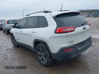 2016 Jeep Cherokee Latitude with VIN 1C4PJMCB7GW268714, listed as a IAAI auction lot 41655450 with 180,603 mi miles. Bid and sale history available at carsss.com. Image 3.