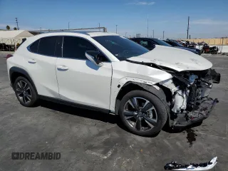 2024 Lexus UX with VIN JTHX6JBH7R2189588, listed as a Copart auction lot 70237664 with 9,963 mi miles and Salvage Title. Bid and sale history available at carsss.com. Image 4.