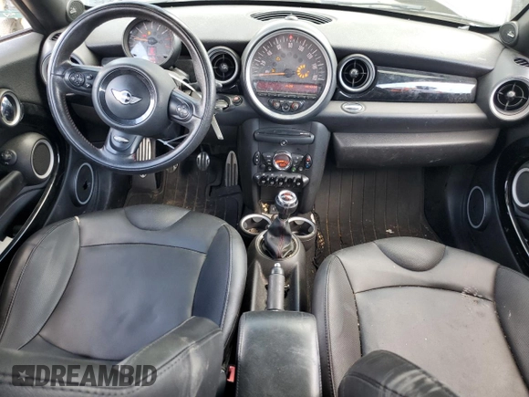 2015 MINI Coupe S z VIN WMWSX3C55FT409449, wystawiony jako Copart lot #66574174 z przebiegiem 99 155 mil mil oraz Szkody całkowita. Historia ofert i sprzedaży dostępna na DreamBid. Obrazek 8.