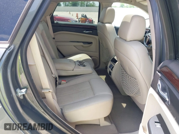 2013 Cadillac SRX Luxury Collection z VIN 3GYFNCE39DS542125, wystawiony jako IAAI lot #42067672 z przebiegiem 158 013 mil mil oraz . Historia ofert i sprzedaży dostępna na DreamBid. Obrazek 8.