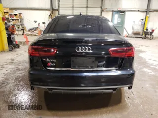 2016 Audi S6 Premium Plus z VIN WAUF2AFC9GN140490, wystawiony jako Copart lot #61523213 z przebiegiem 58 236 mil mil oraz . Historia ofert i sprzedaży dostępna na DreamBid. Obrazek 6.