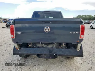 2014 Ram 2500 Laramie z VIN 3C6UR5FL4EG183158, wystawiony jako Copart lot #61846925 z przebiegiem 199 961 mil mil oraz Szkoda całkowita • Salvage title. Historia ofert i sprzedaży dostępna na DreamBid. Obrazek 6.