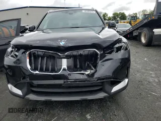 2023 BMW X1 xDrive28i with VIN WBX73EF09P5W64467, listed as a Copart auction lot 58586875 with 29,022 mi miles and Salvage title. Bid and sale history available at DreamBid. Image 5.