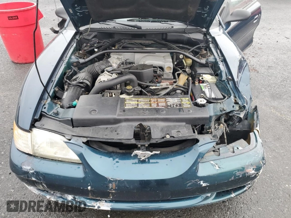 1994 Ford Mustang z VIN 1FALP45T3RF143074, wystawiony jako Copart lot #51442685 z przebiegiem 144 966 mil mil oraz Szkoda całkowita • Salvage title. Historia ofert i sprzedaży dostępna na DreamBid. Obrazek 11.