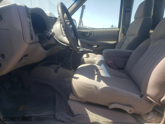 2003 Chevrolet S-10 with VIN 1GCCS19H638267297, listed as a Copart auction lot 69115764 with 53,056 mi miles and Salvage Title. Bid and sale history available at carsss.com. Image 7.