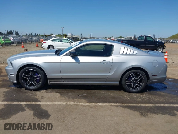 2013 Ford Mustang V6 with VIN 1ZVBP8AM4D5212653, listed as a IAAI auction lot 42090402 with 134,437 mi miles. Bid and sale history available at carsss.com. Image 14.